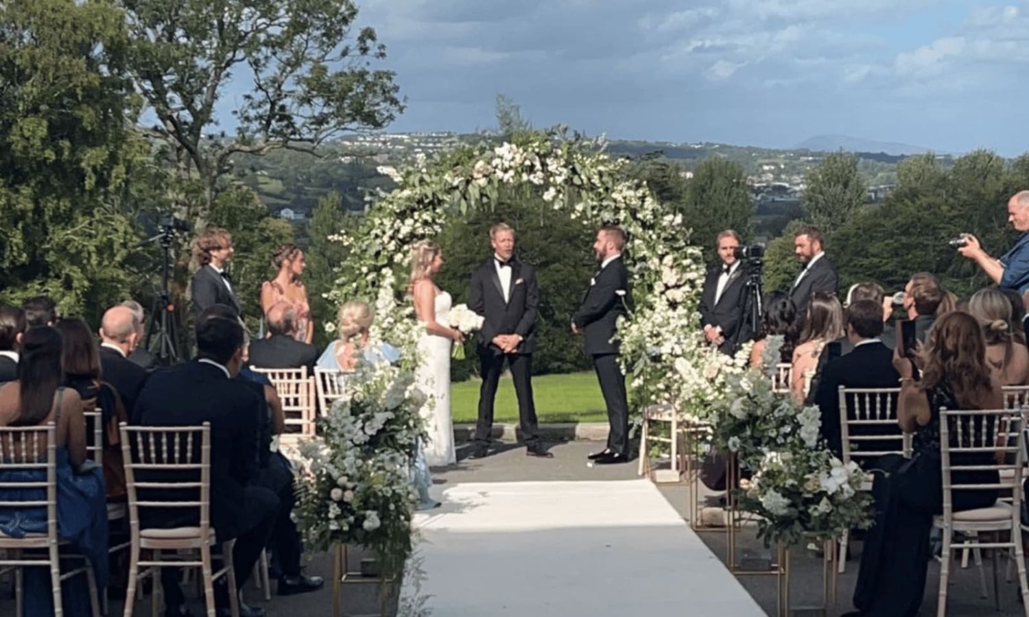 Outdoor wedding ceremony overlooking Letterkenny and the Donegal countryside at the historic country house Rockhill House Estate letterkenny county donegal